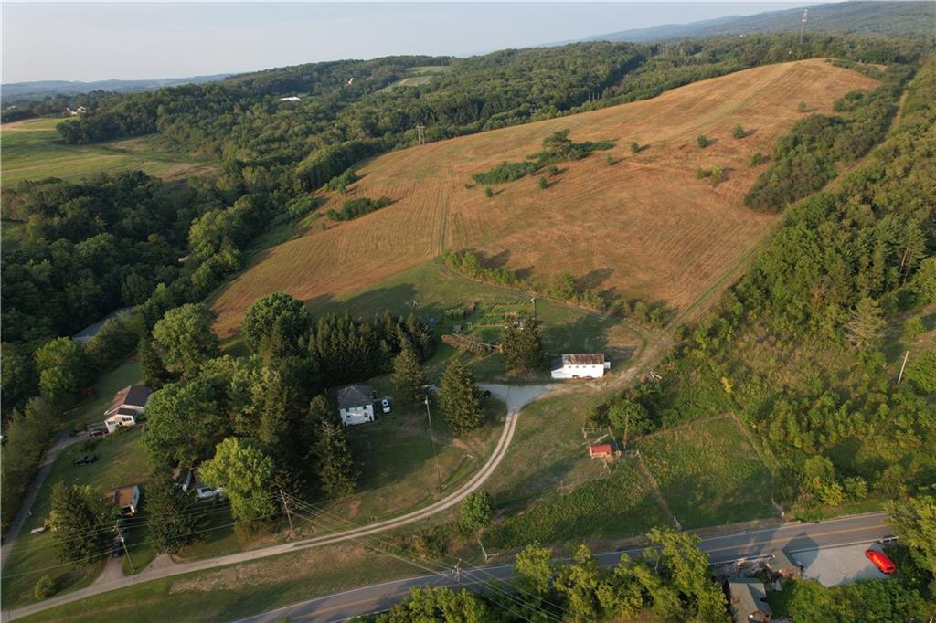 0 Tanner Lane Latrobe, PA 15650 - Photo 8 of 20 an aerial view of residential houses with outdoor space and trees