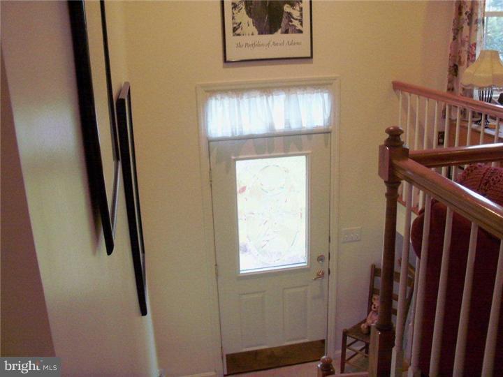 342 Pine Grove Road Nottingham, PA 19362 - Photo 7 of 19 a view of an entryway with a mirror