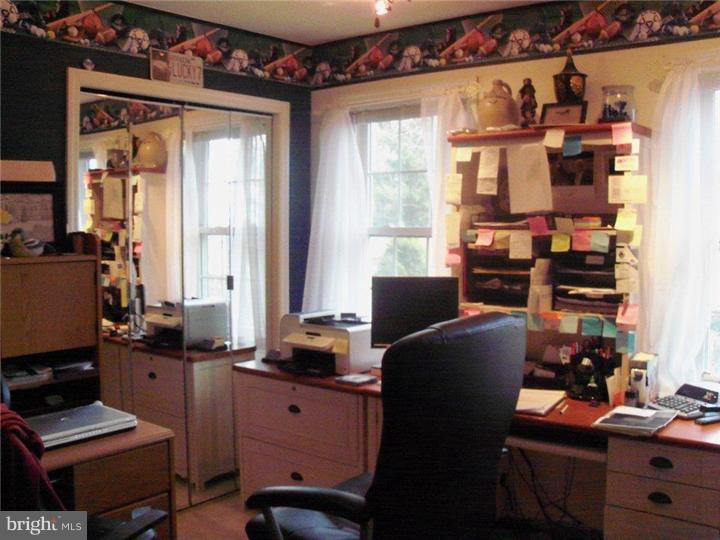 342 Pine Grove Road Nottingham, PA 19362 - Photo 8 of 19 a view of a workspace with furniture and a window
