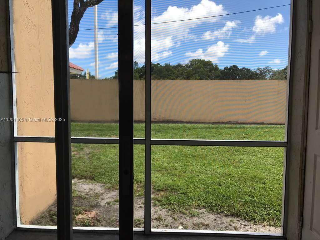 2173 Southwest 80th Terrace, Unit 2173 Miramar, FL 33025 - Photo 30 of 31 a view of a lake from a window