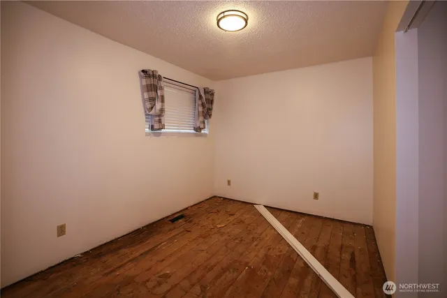 an empty room with a workbench