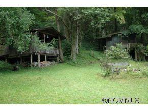 Na Heck Creek Road Marshall, NC 28753 - Photo 11 of 12 a backyard of a house with lots of green space