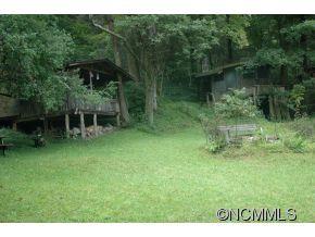 Na Heck Creek Road Marshall, NC 28753 - Photo 12 of 12 a backyard of a house with table and chairs