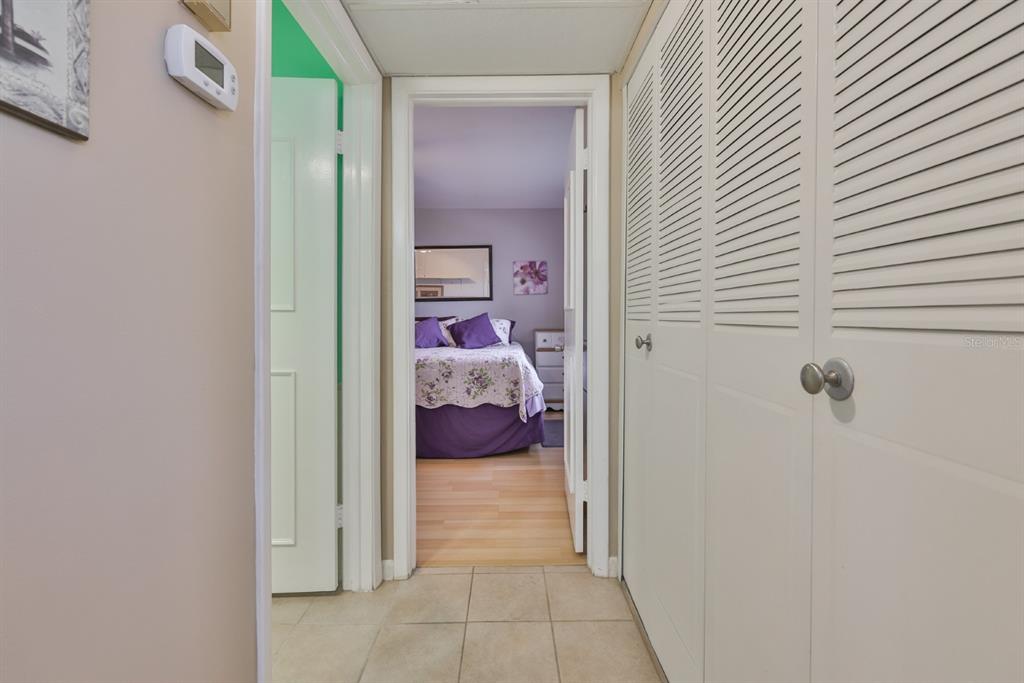 1901 Andover Way, Unit 38 Sun City Center, FL 33573 - Photo 16 of 54 a bedroom with a bed and a shower