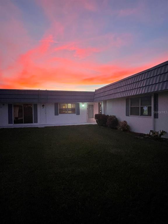 1901 Andover Way, Unit 38 Sun City Center, FL 33573 - Photo 54 of 54 a view of a house with many windows