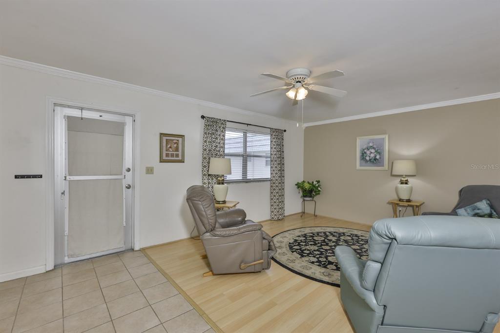 1901 Andover Way, Unit 38 Sun City Center, FL 33573 - Photo 6 of 54 a living room with furniture and window