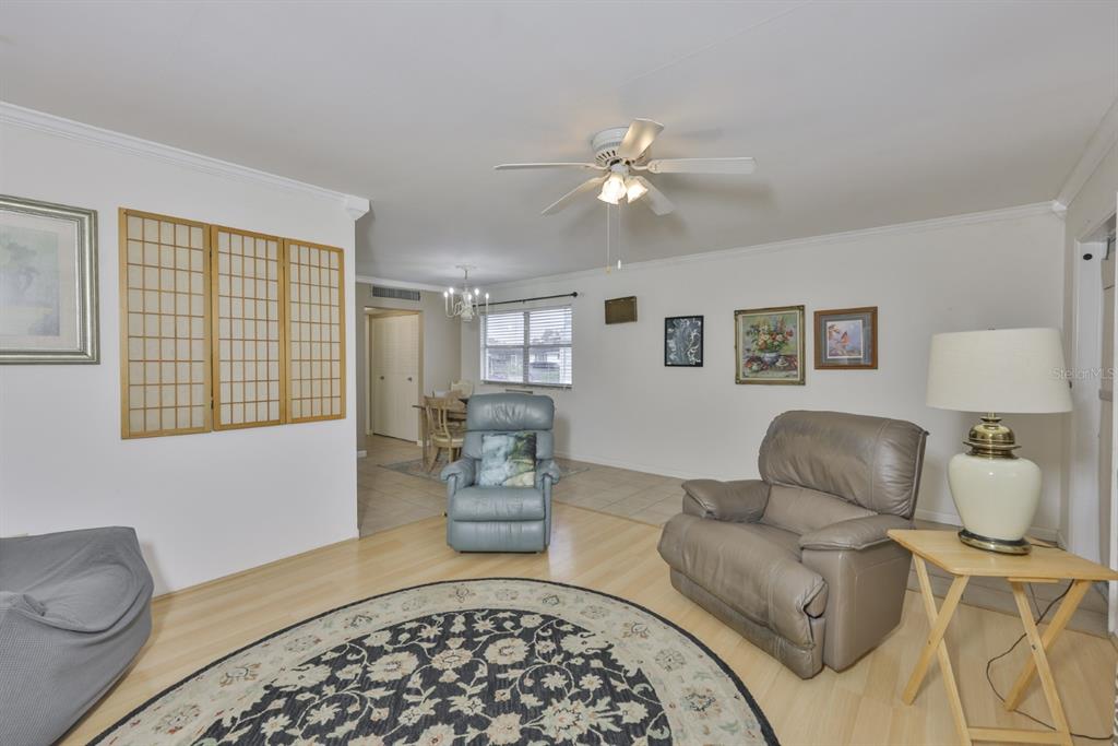 1901 Andover Way, Unit 38 Sun City Center, FL 33573 - Photo 9 of 54 a living room with furniture and a window