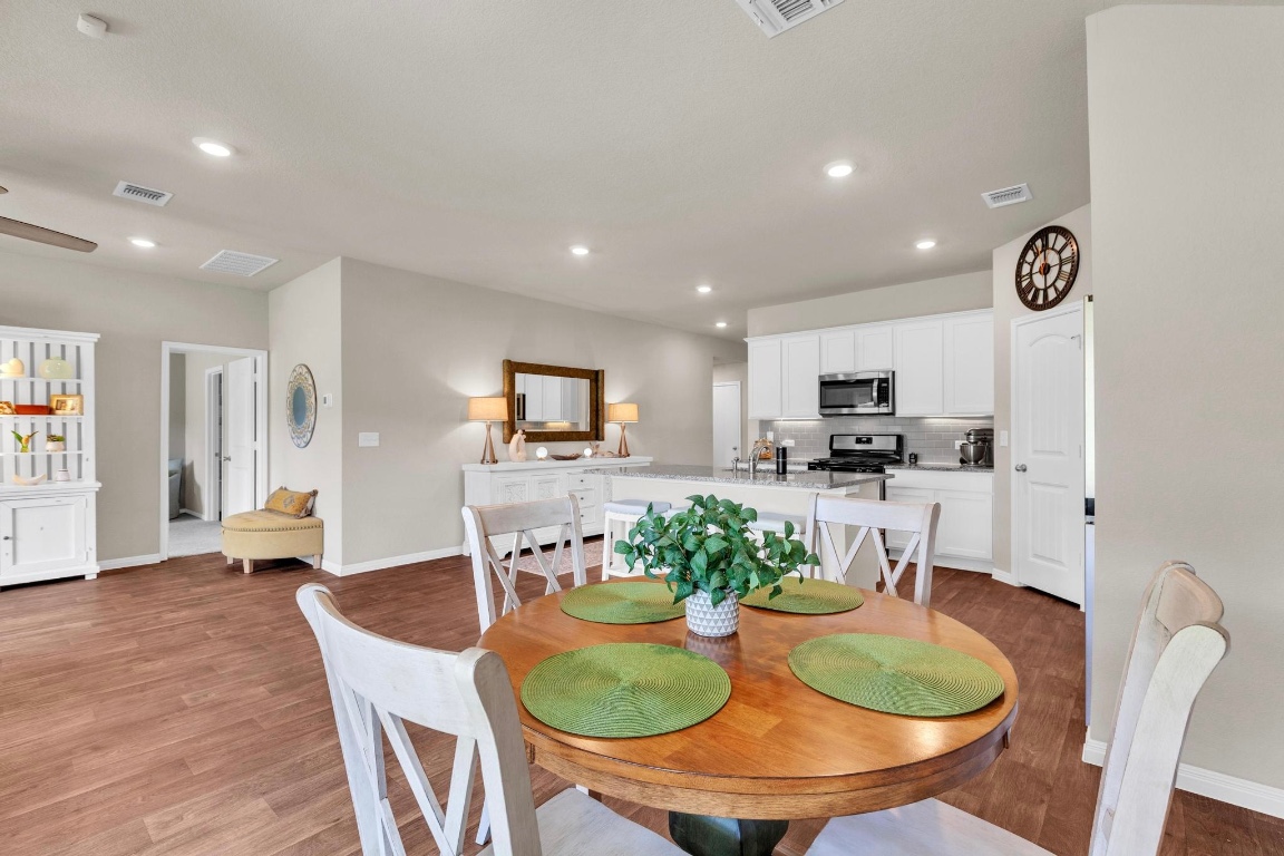 19525 Abigail Fillmore Road Manor, TX 78653 - Photo 17 of 40 Dining room with light wood-style flooring and recessed lighting