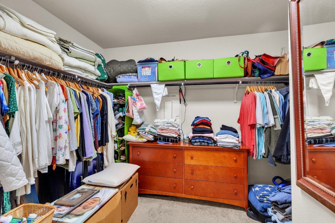 19525 Abigail Fillmore Road Manor, TX 78653 - Photo 23 of 40 Walk in closet with light colored carpet