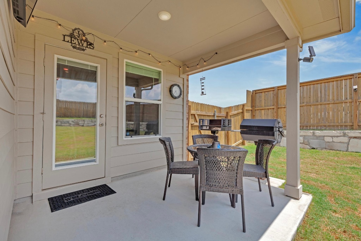 19525 Abigail Fillmore Road Manor, TX 78653 - Photo 32 of 40 View of patio / terrace with outdoor dining area