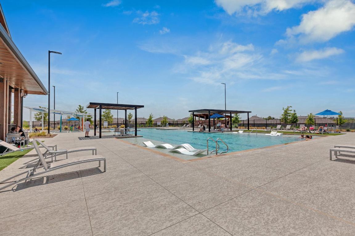 19525 Abigail Fillmore Road Manor, TX 78653 - Photo 40 of 40 Community pool with a patio