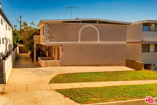 a front view of a house with swimming pool
