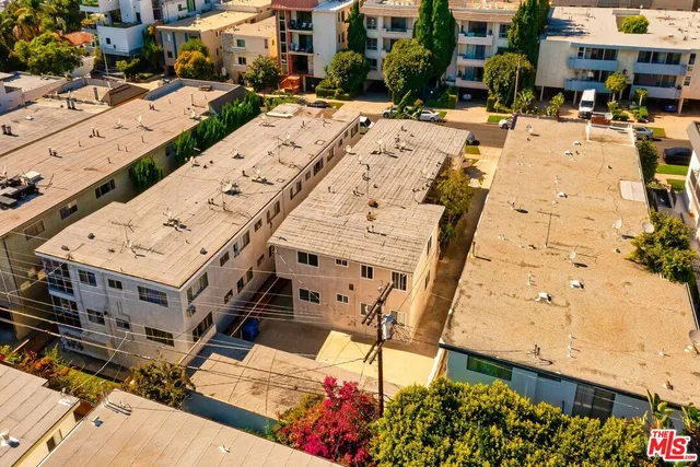 a front view of a building with an outdoor space