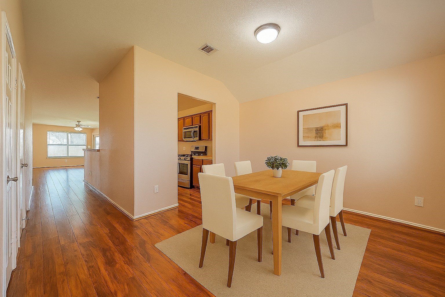 3611 Apache Meadows Drive Baytown, TX 77521 - Photo 3 of 12 a view of a dining room with furniture and wooden floor