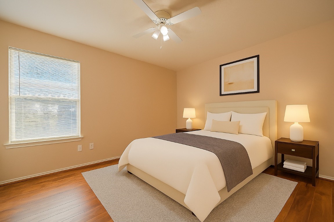 3611 Apache Meadows Drive Baytown, TX 77521 - Photo 6 of 12 a bedroom with a bed and a window