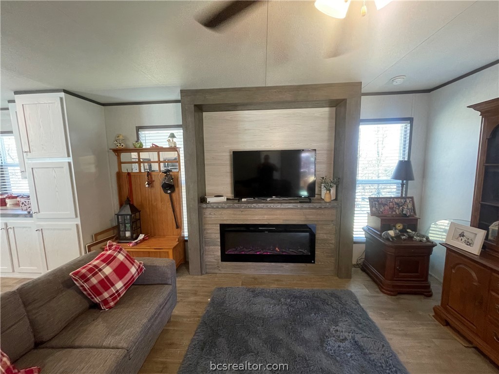 11320 Old Hearne Road Bryan, TX 77807 - Photo 5 of 26 a living room with furniture and a flat screen tv
