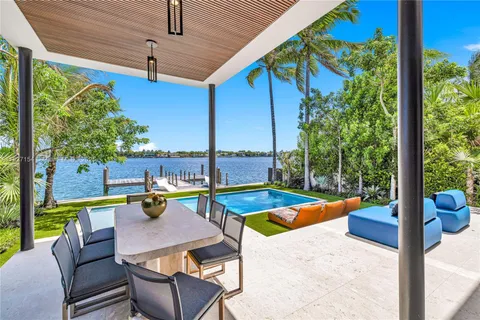 a view of a patio with swimming pool