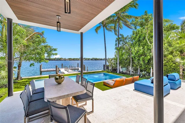 a view of a patio with swimming pool