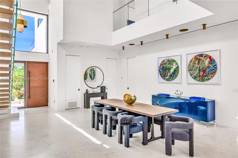 a view of a backyard with swimming pool