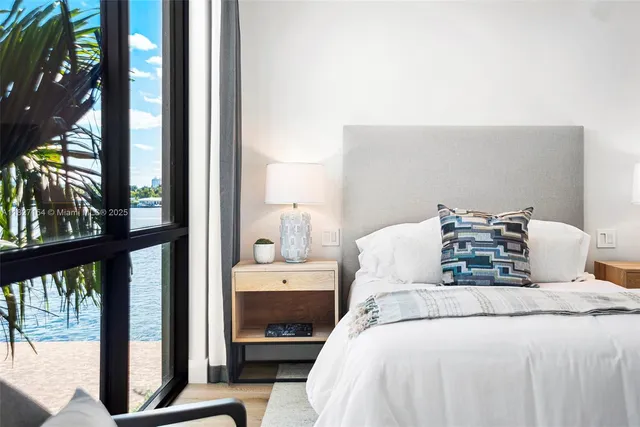 a view of a house with swimming pool and a yard