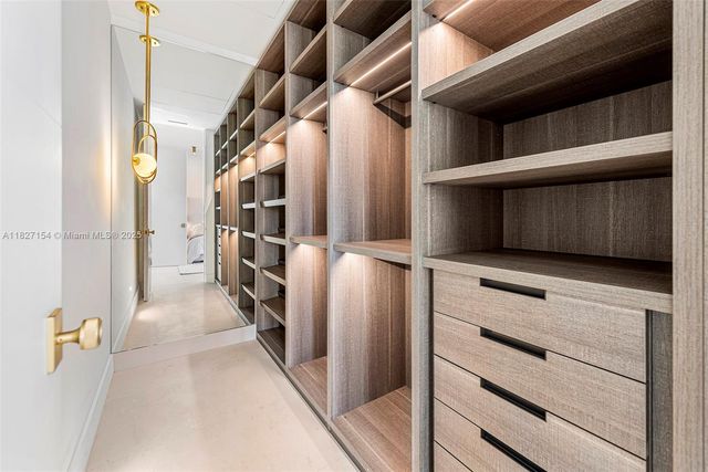 a view of an outdoor space with furniture and garden