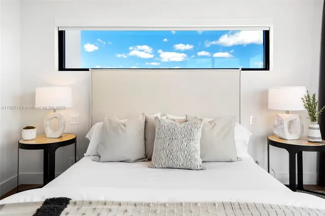 a view of swimming pool with outdoor seating and yard in the back