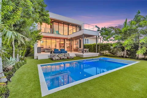 a view of a patio with couches chairs dining table and chairs