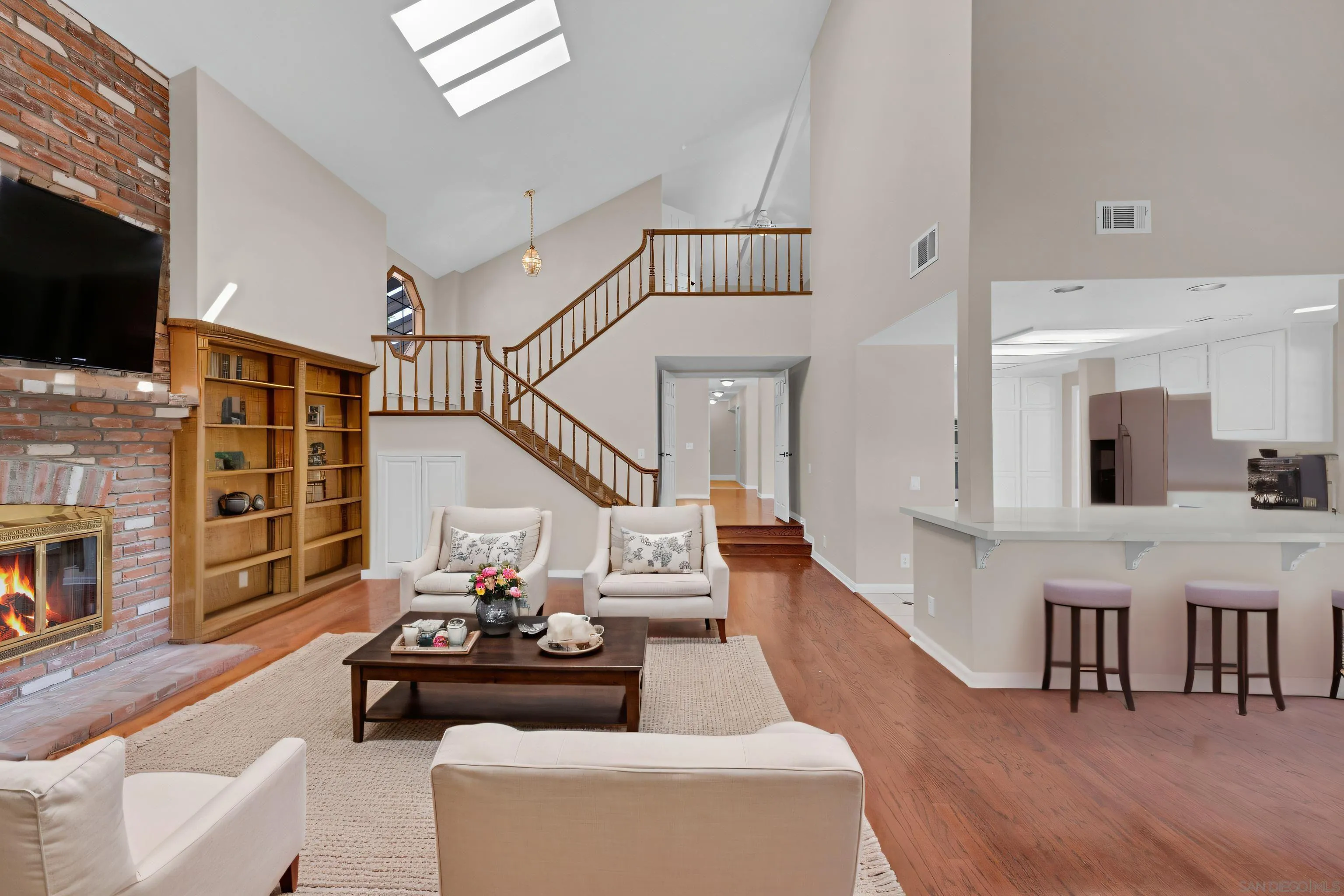 15235 Crestview Court Poway, CA 92064 - Photo 15 of 75 a living room with furniture and a fireplace