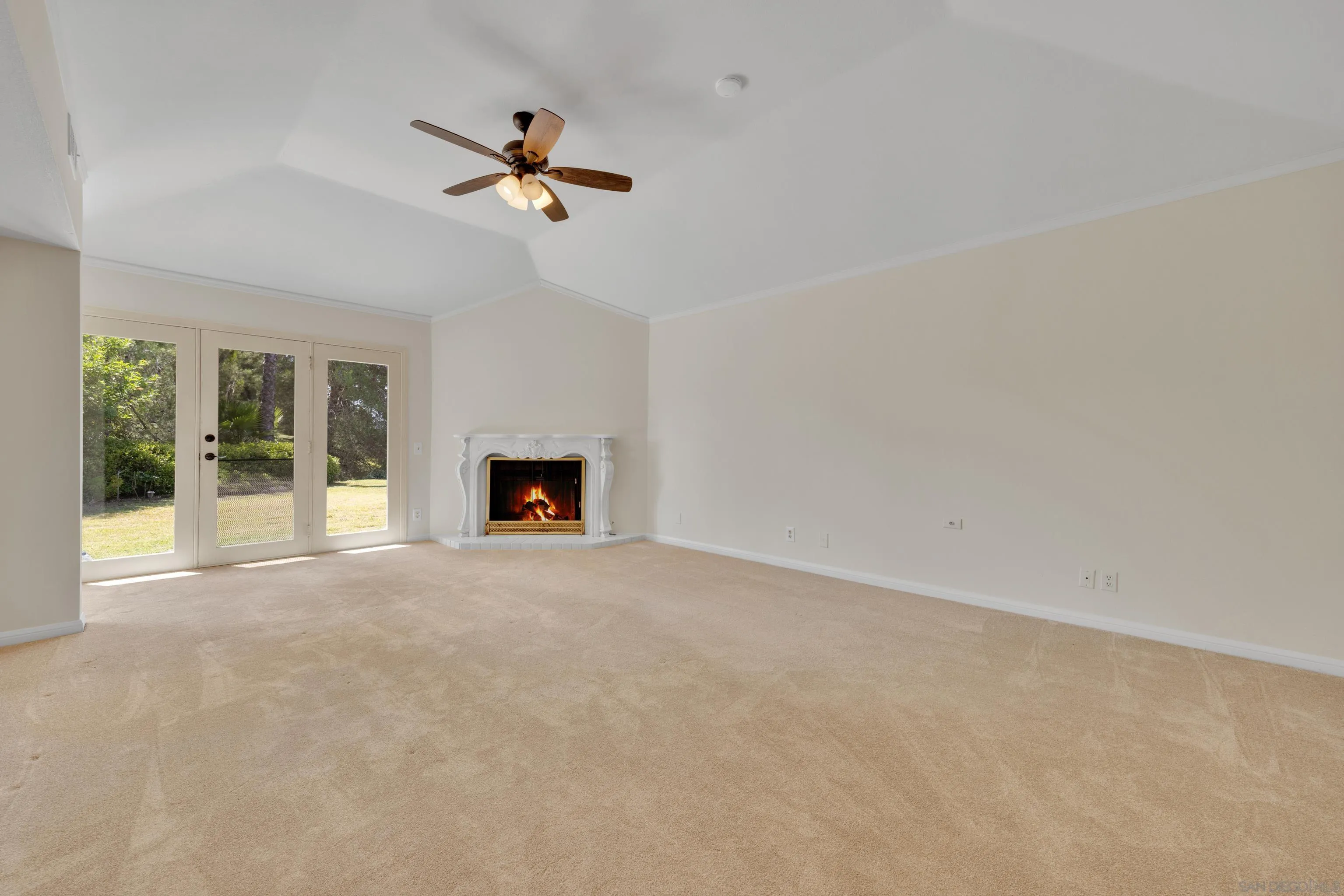 15235 Crestview Court Poway, CA 92064 - Photo 26 of 75 a view of a livingroom with a ceiling fan and window