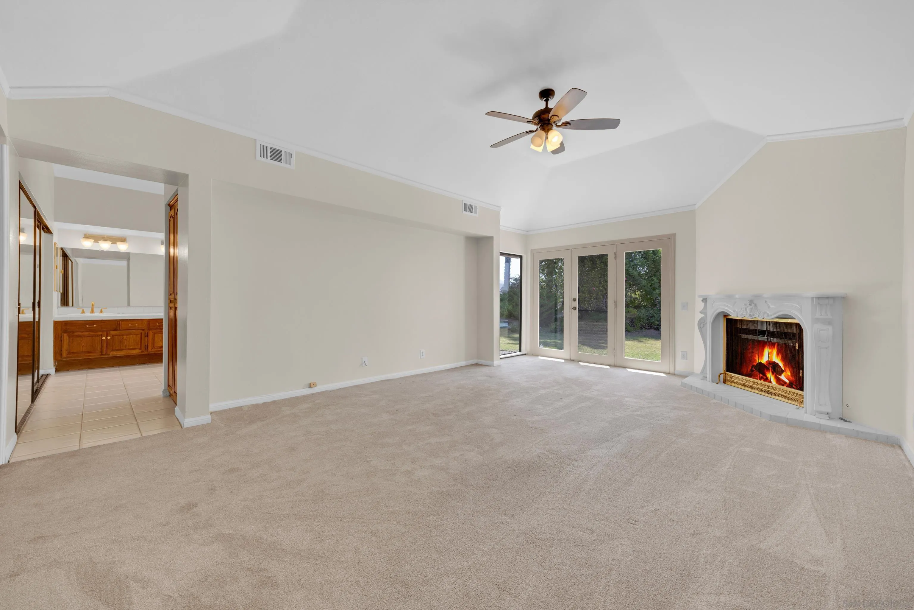 15235 Crestview Court Poway, CA 92064 - Photo 28 of 75 a view of a livingroom with a ceiling fan and window