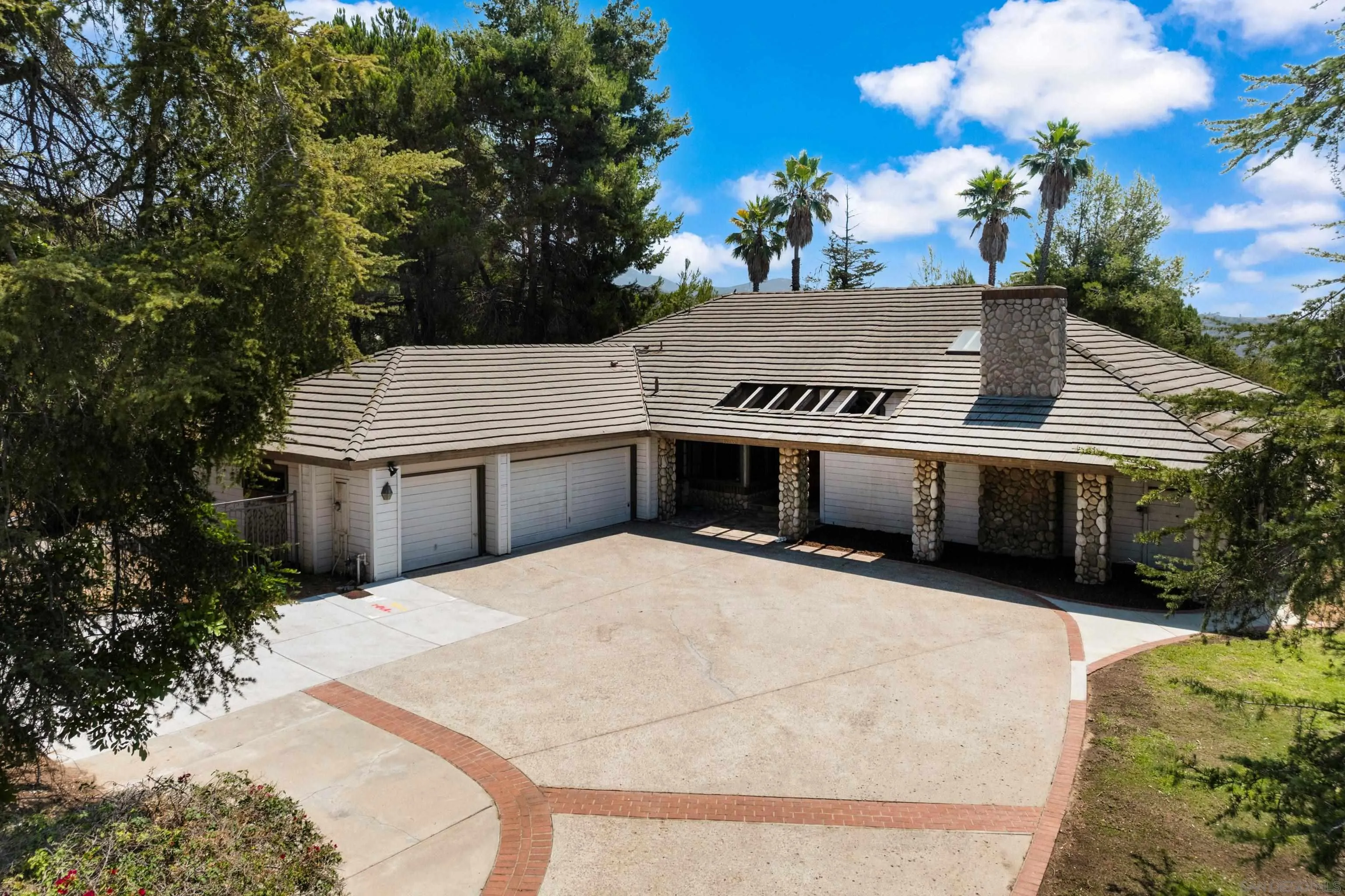 15235 Crestview Court Poway, CA 92064 - Photo 3 of 75 a house view with a backyard space