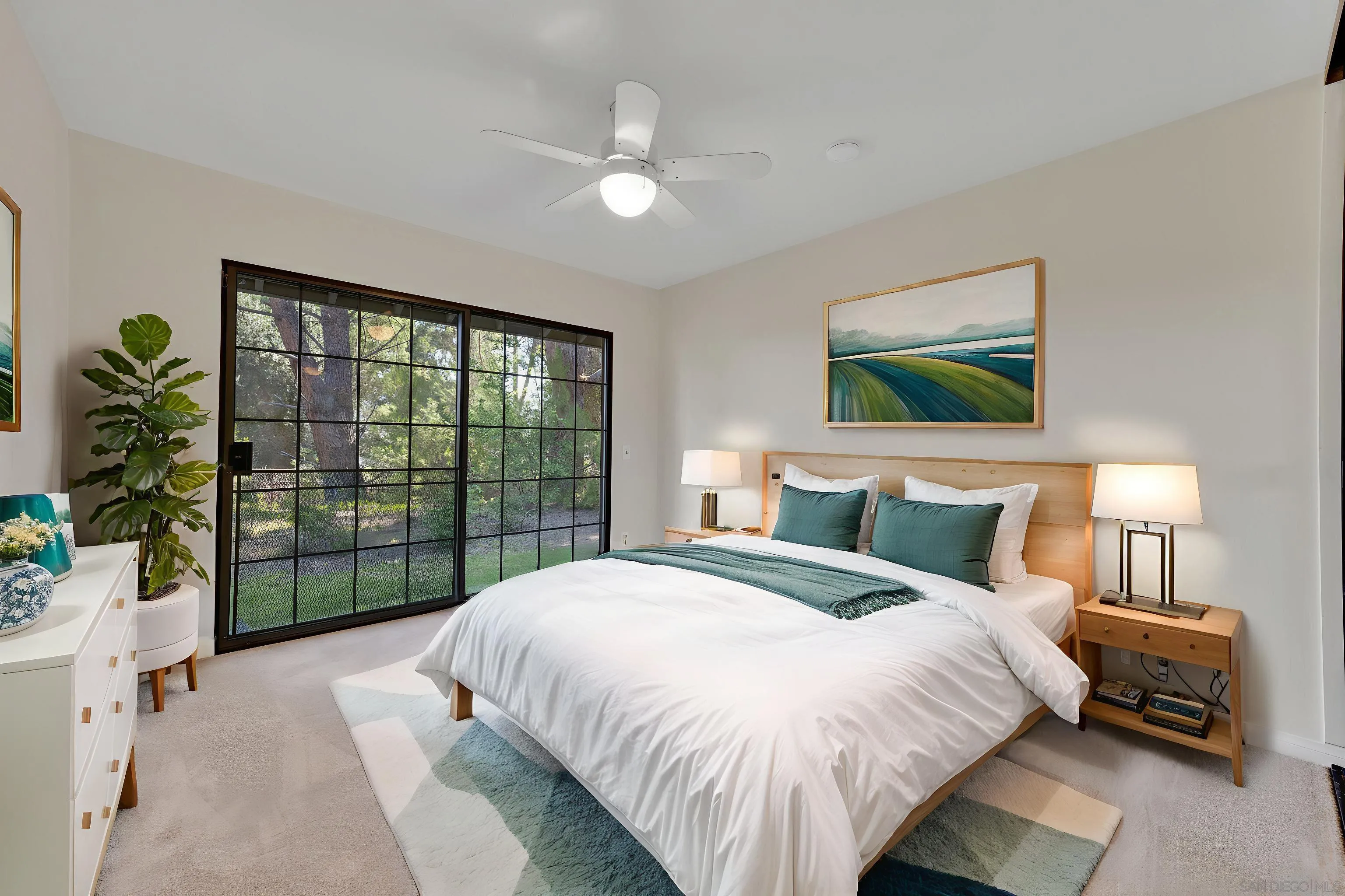 15235 Crestview Court Poway, CA 92064 - Photo 36 of 75 a bedroom with a large bed and a flat tv screen