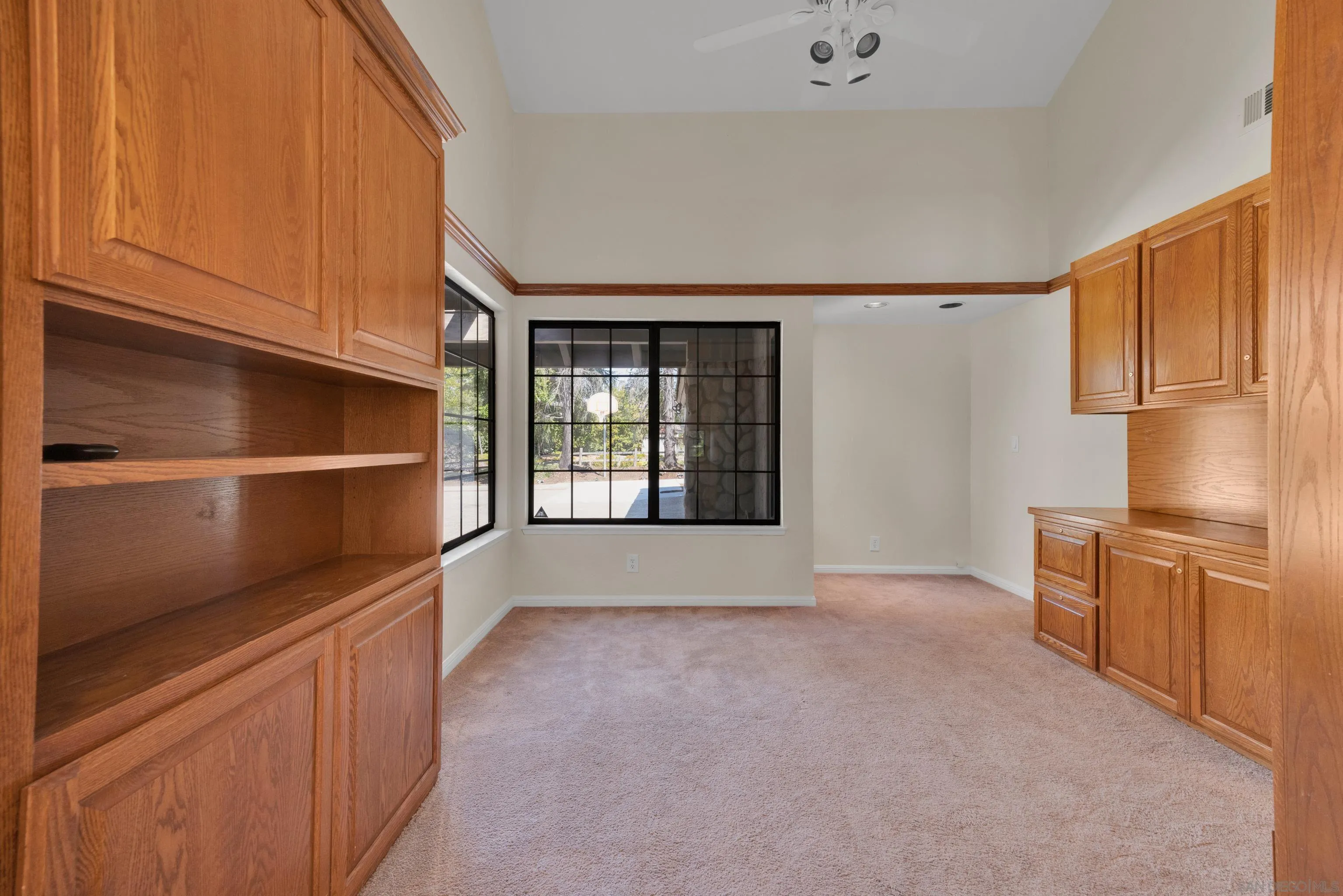 15235 Crestview Court Poway, CA 92064 - Photo 44 of 75 a view of an empty room with a kitchen