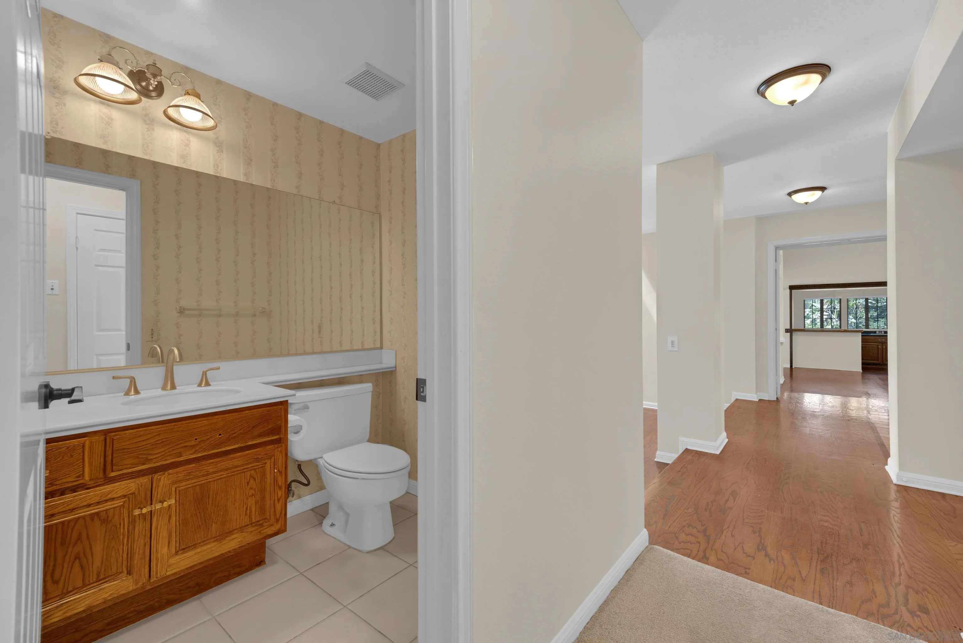 15235 Crestview Court Poway, CA 92064 - Photo 46 of 75 a bathroom with a sink a toilet and shower