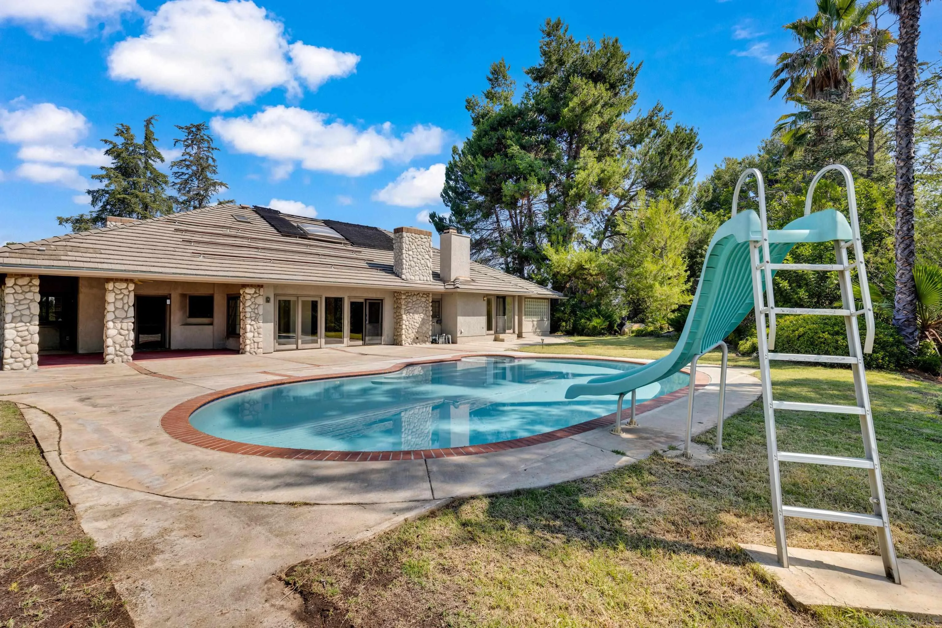 15235 Crestview Court Poway, CA 92064 - Photo 64 of 75 a view of a house with a backyard