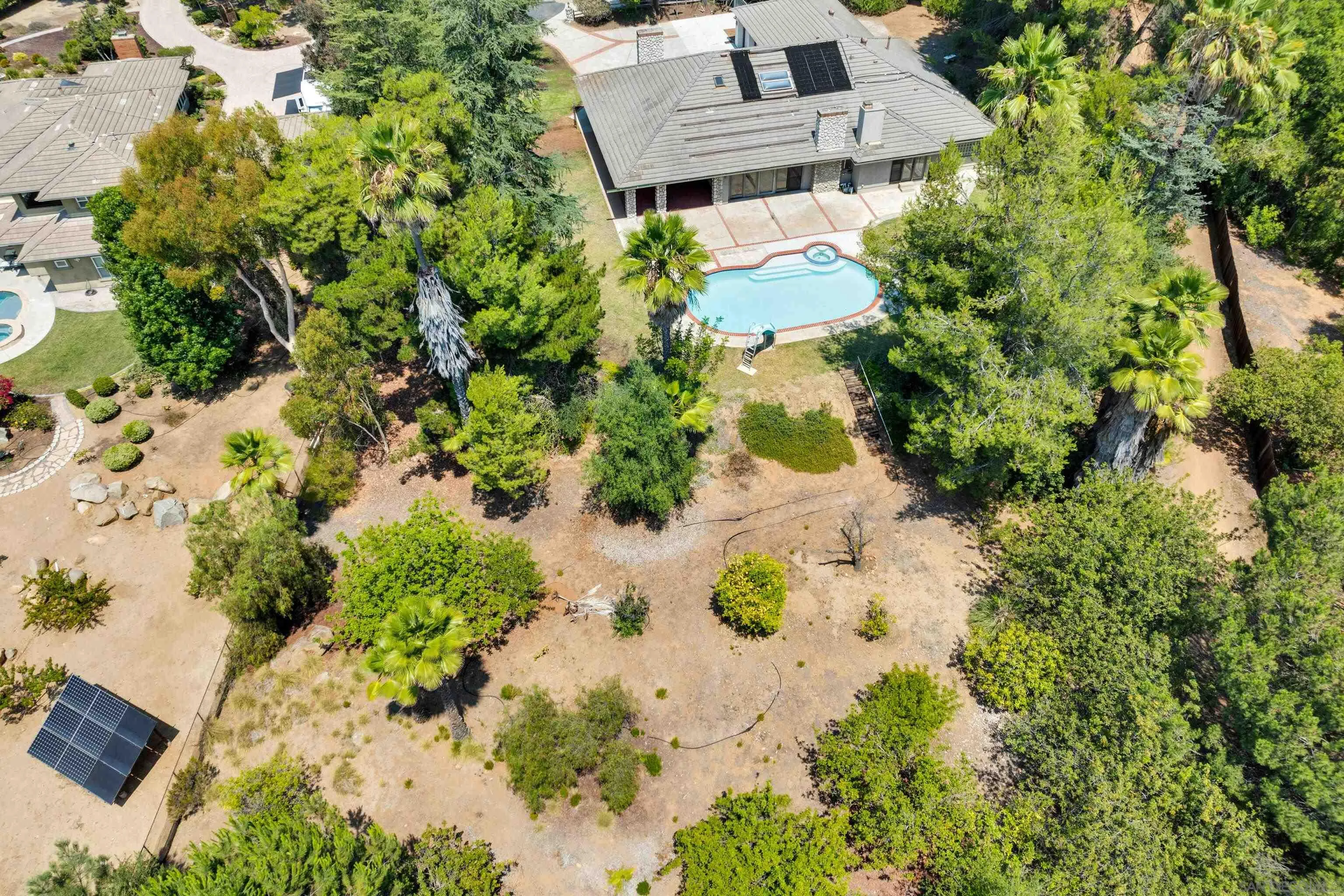 15235 Crestview Court Poway, CA 92064 - Photo 67 of 75 an aerial view of a house with a yard and garden