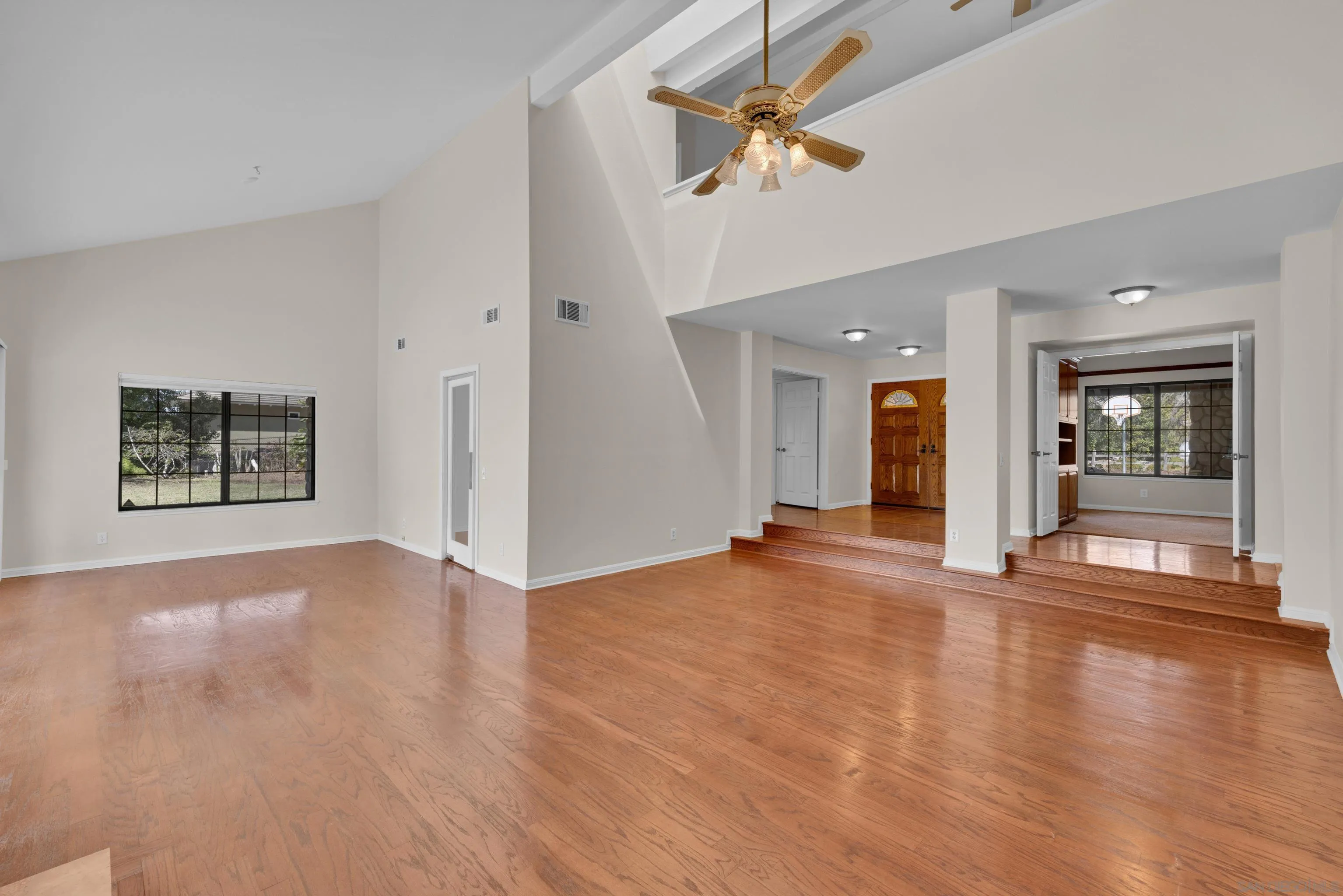 15235 Crestview Court Poway, CA 92064 - Photo 9 of 75 an empty room with fan and windows