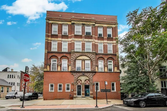 a front view of a building and a street