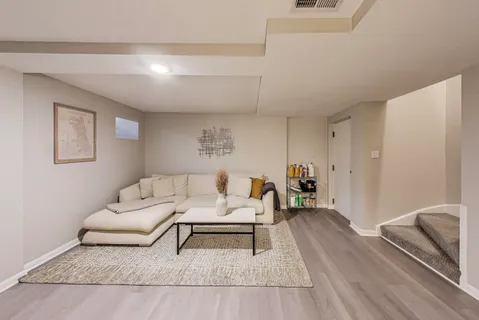 a living room with furniture and a couch