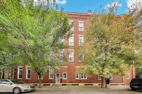 a view of a building and a street