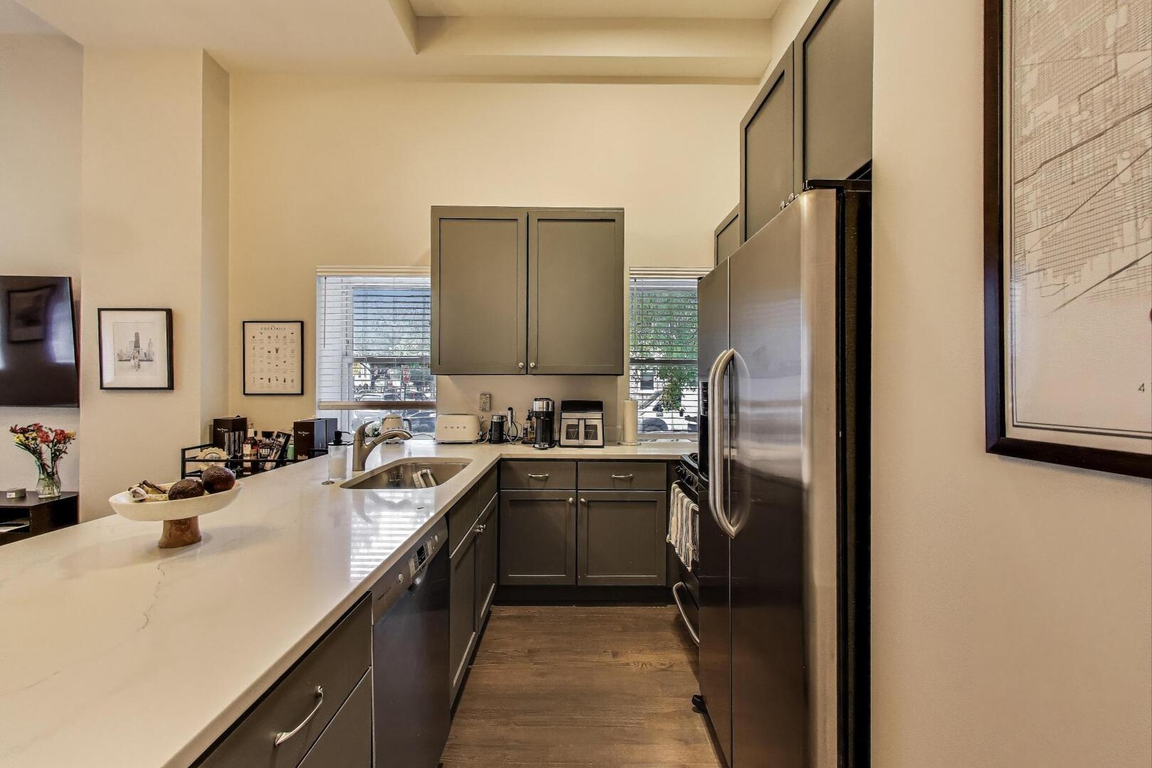 1521 North Paulina Street, Unit 1F Chicago, IL 60622 - Photo 7 of 21 a kitchen with a sink stove and refrigerator