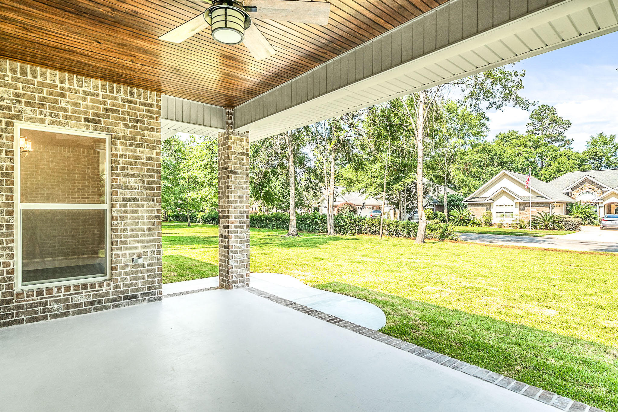 4809 Grove Street Crestview, FL 32539 - Photo 6 of 28 a view of swimming pool with an outdoor space and seating area