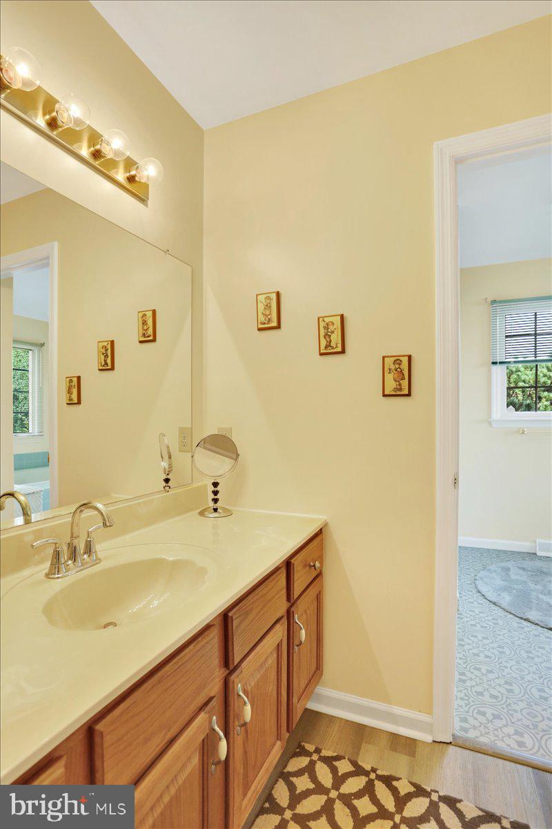 12 Archer Lane Reading, PA 19607 - Photo 19 of 39 a bathroom with a sink and a mirror