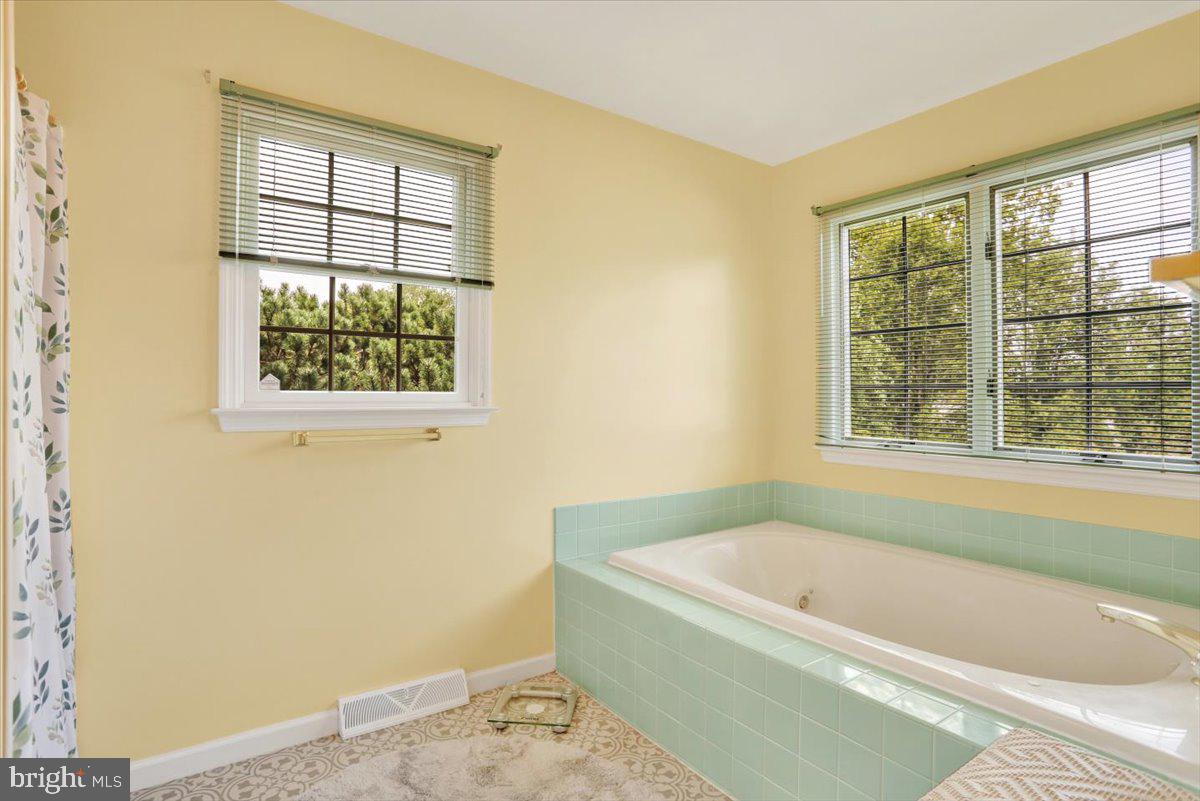 12 Archer Lane Reading, PA 19607 - Photo 20 of 39 a bath tub sitting next to a window