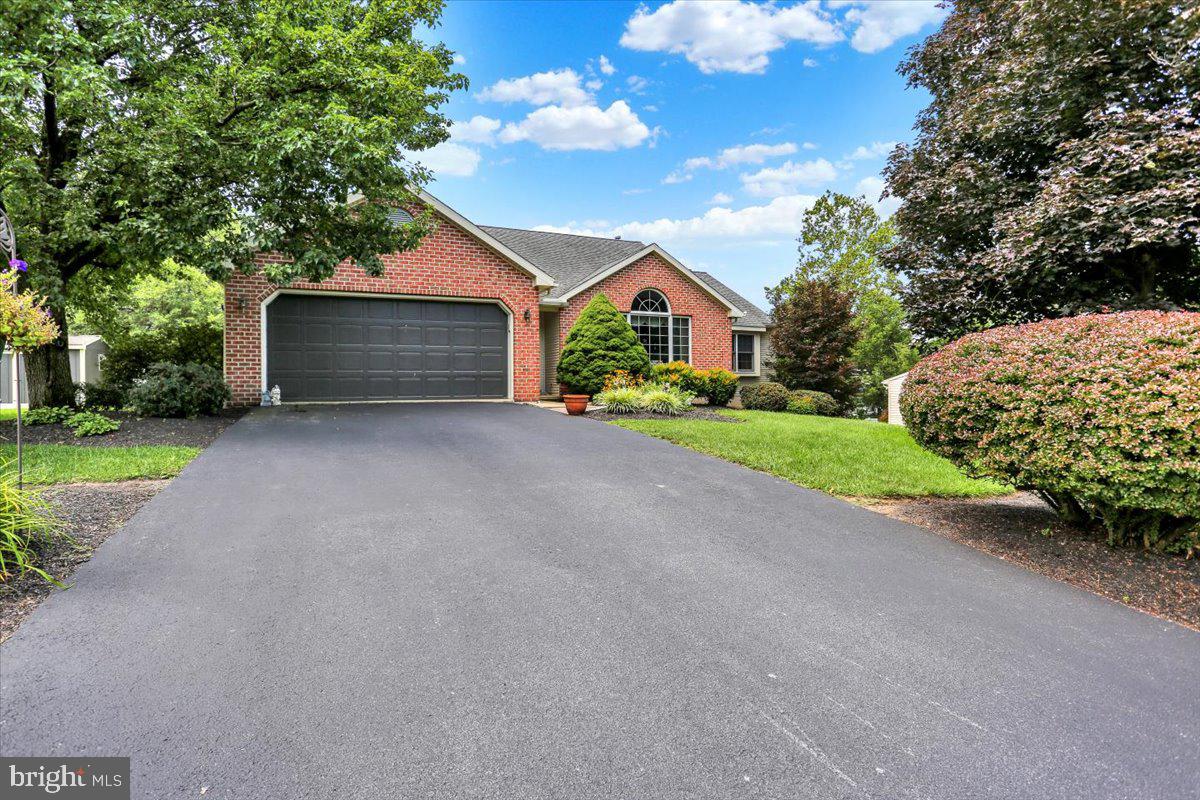 12 Archer Lane Reading, PA 19607 - Photo 2 of 39 a front view of a house with a yard and garage