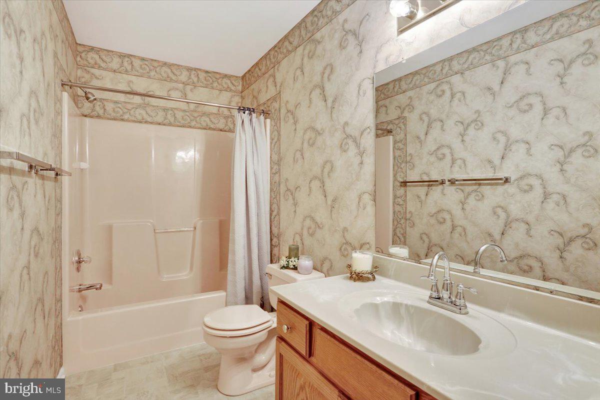 12 Archer Lane Reading, PA 19607 - Photo 29 of 39 a bathroom with a sink toilet and shower