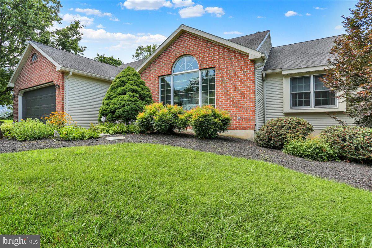 12 Archer Lane Reading, PA 19607 - Photo 3 of 39 a front view of a house with garden