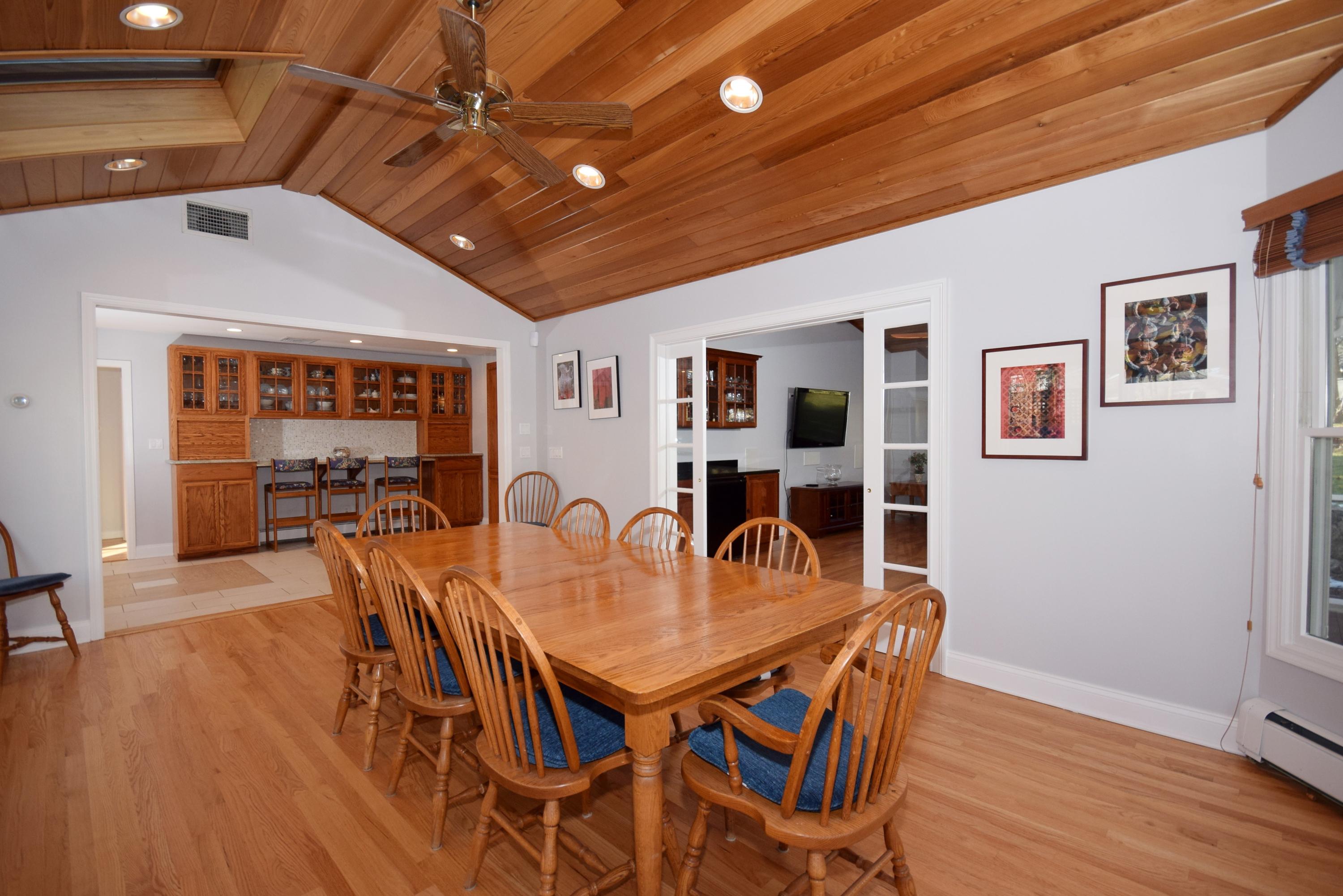 6 Wilson Ridge Road East Darien, CT 06820 - Photo 11 of 25 a view of a dining room with furniture window and wooden floor