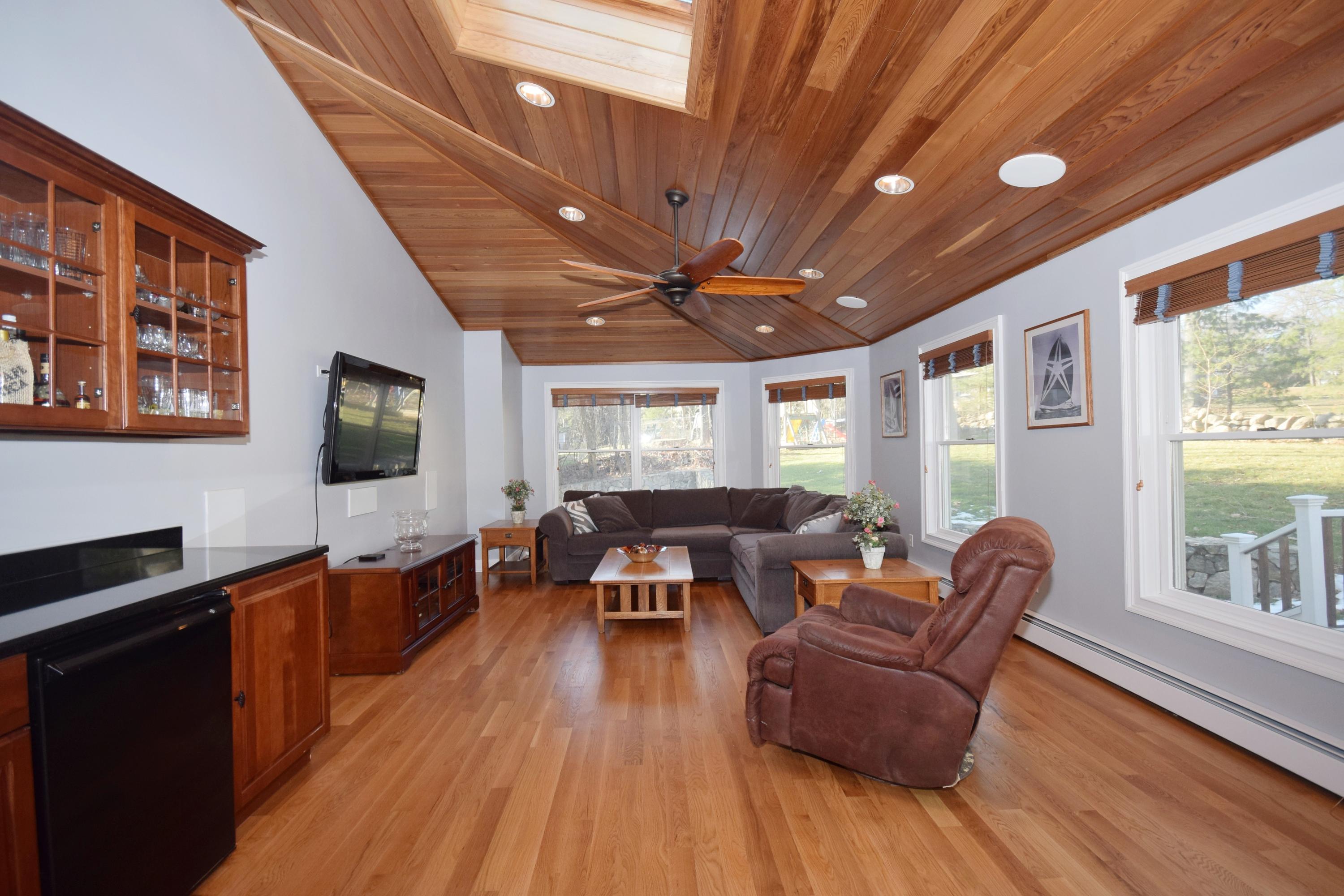 6 Wilson Ridge Road East Darien, CT 06820 - Photo 14 of 25 a living room with furniture a large window and wooden floors