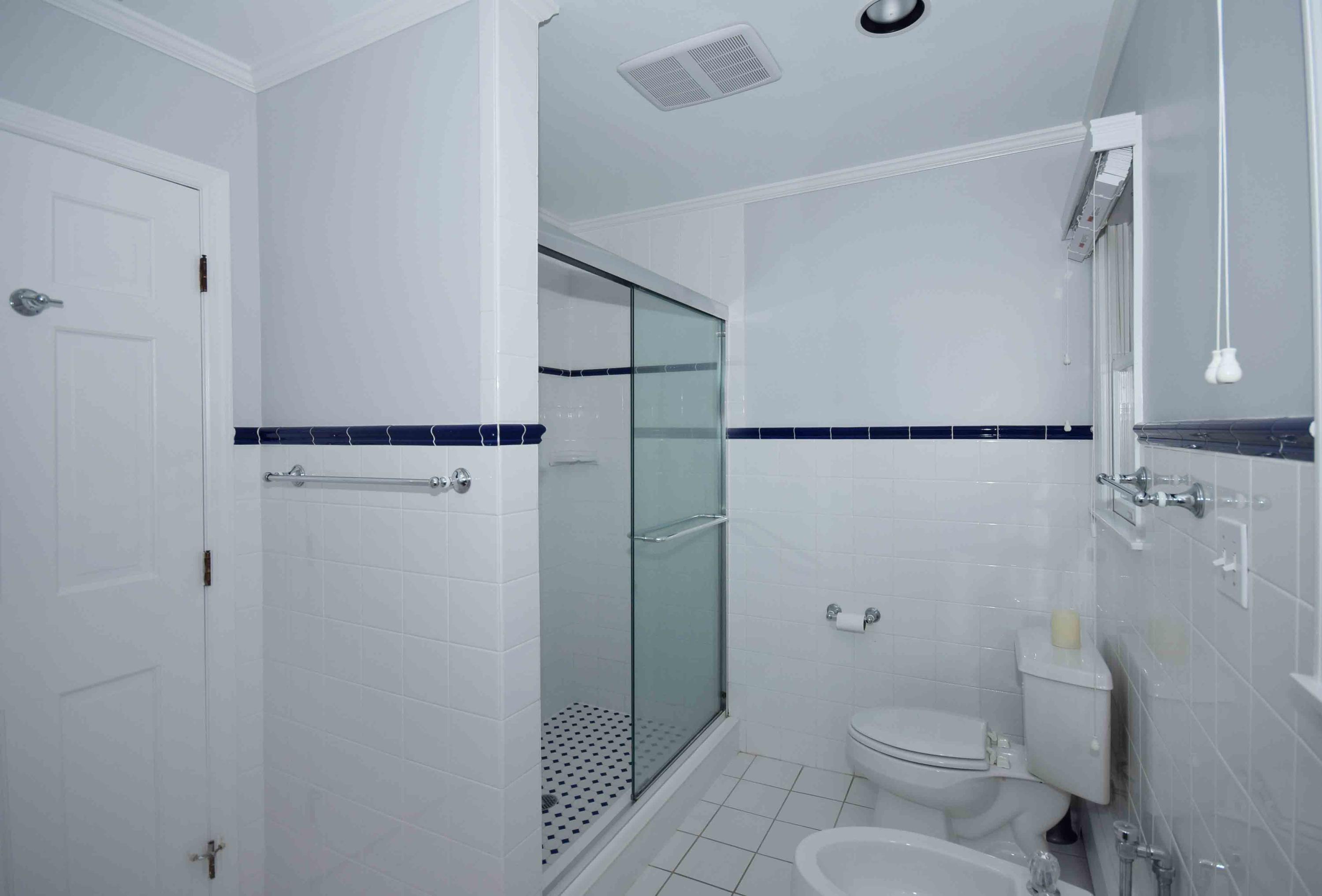 6 Wilson Ridge Road East Darien, CT 06820 - Photo 19 of 25 a bathroom with a toilet and a shower